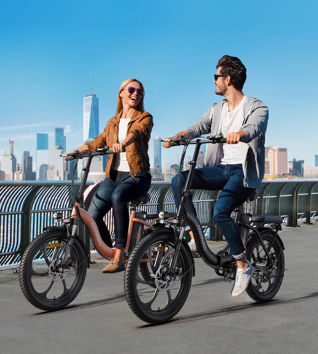 2 person riding on  step through electric bike