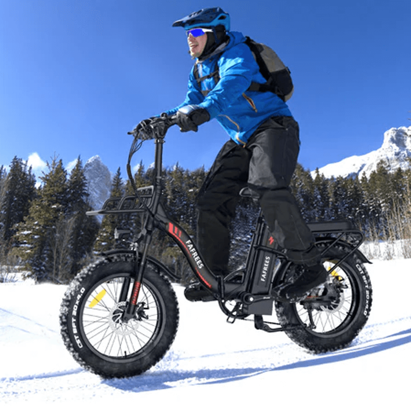 a-man-rides-on-a-fafrees-f20-max-in-the-snow